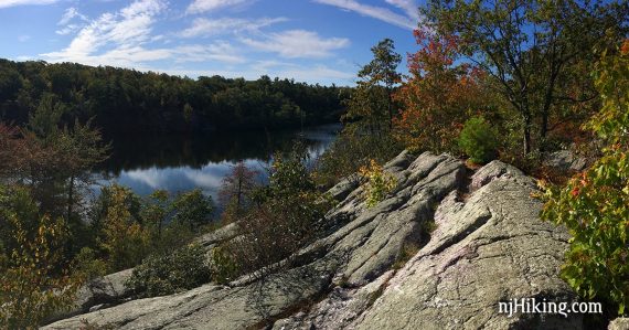 Terrace Pond with prominent rocks in the foreground.